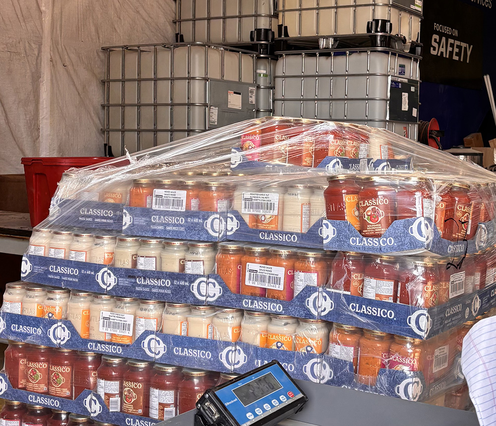food waste, pasta sauce jars been weighed in a warehouse